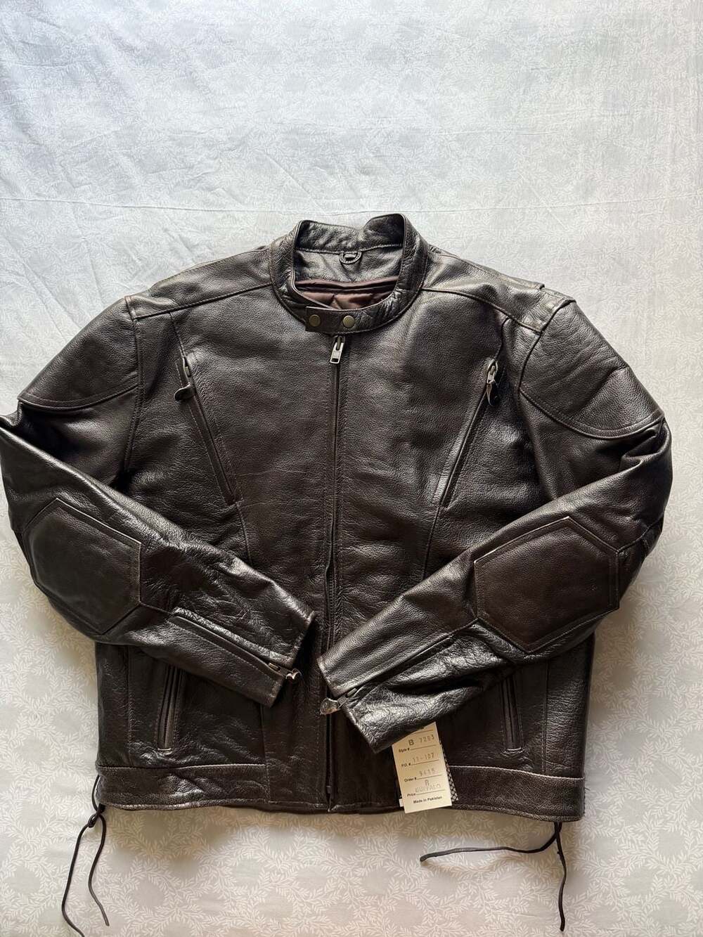 "New With Tags", "Xelement Motorcycle Jacket", "Buffalo Leather" y "Size 2XL".